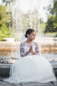 Beautiful First Holy Communion Dresses. Plus Size Communion Dresses. Communion Veils. Holy Communion Dress available in sizes 2 to 24.  Shop our collection of classic styles by appointment at our retail store or on line 24/7.
